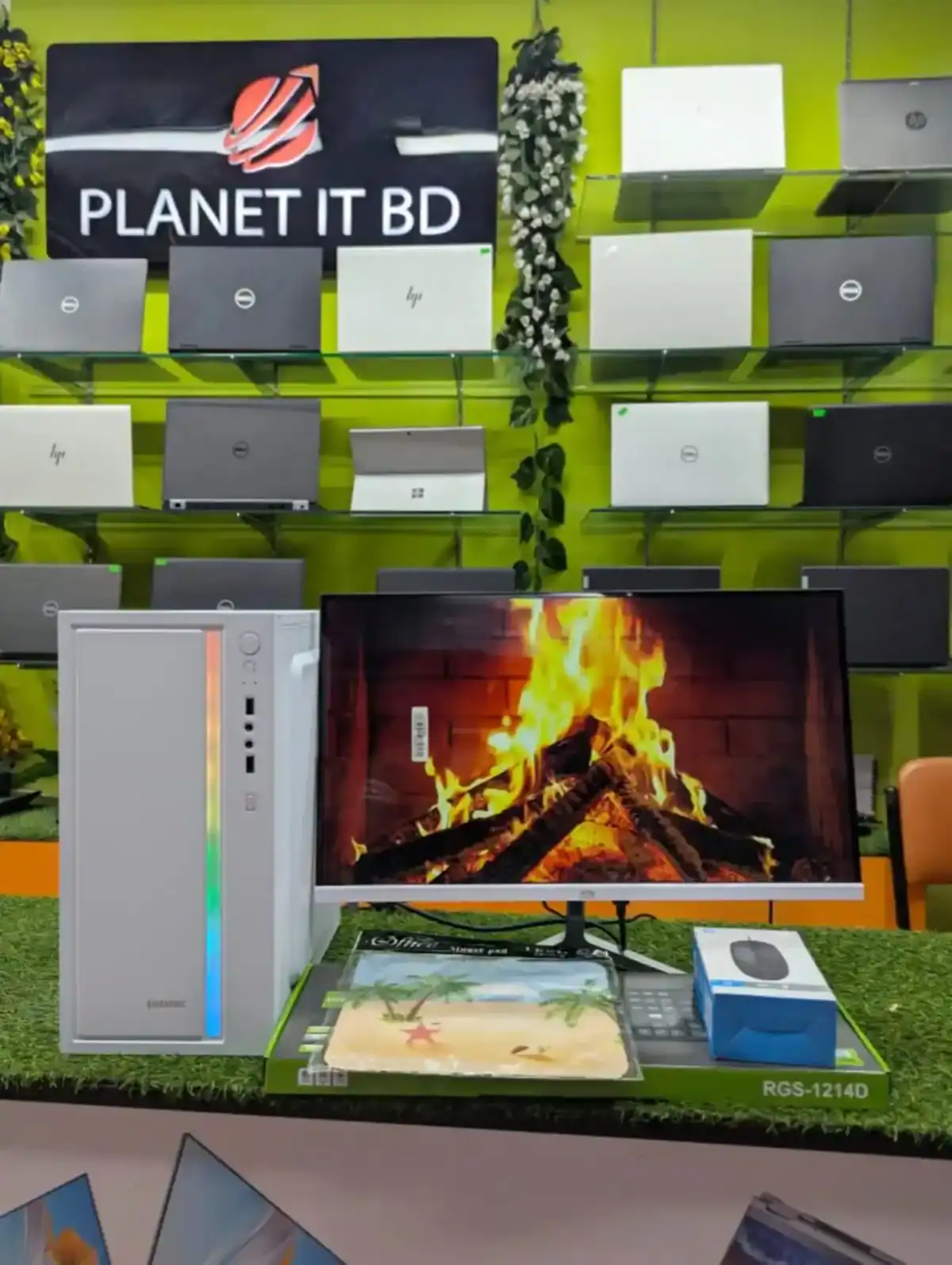 High-performance gaming desktop computer with 4K monitor featuring realistic fire animation, showcased at Planet IT BD store, the leading seller of gaming PCs and computer accessories in Bangladesh.